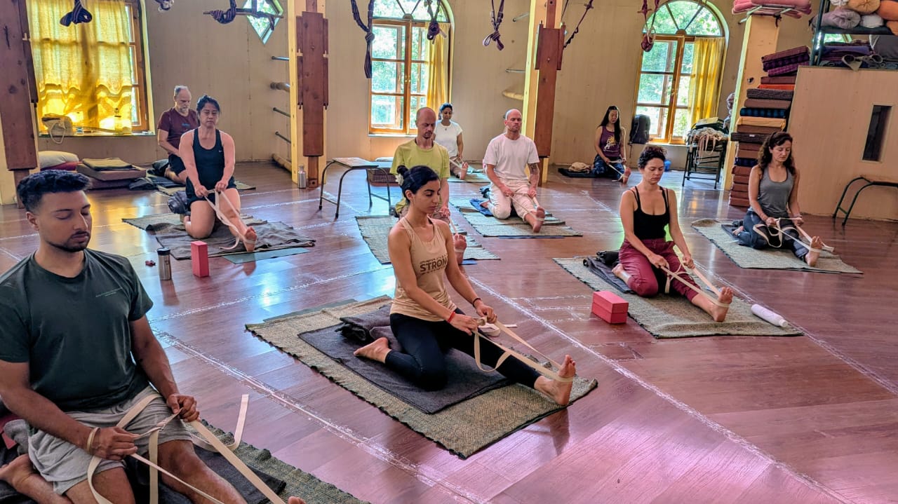 Iyengar yoga group class with props at HIYC Dharamkot